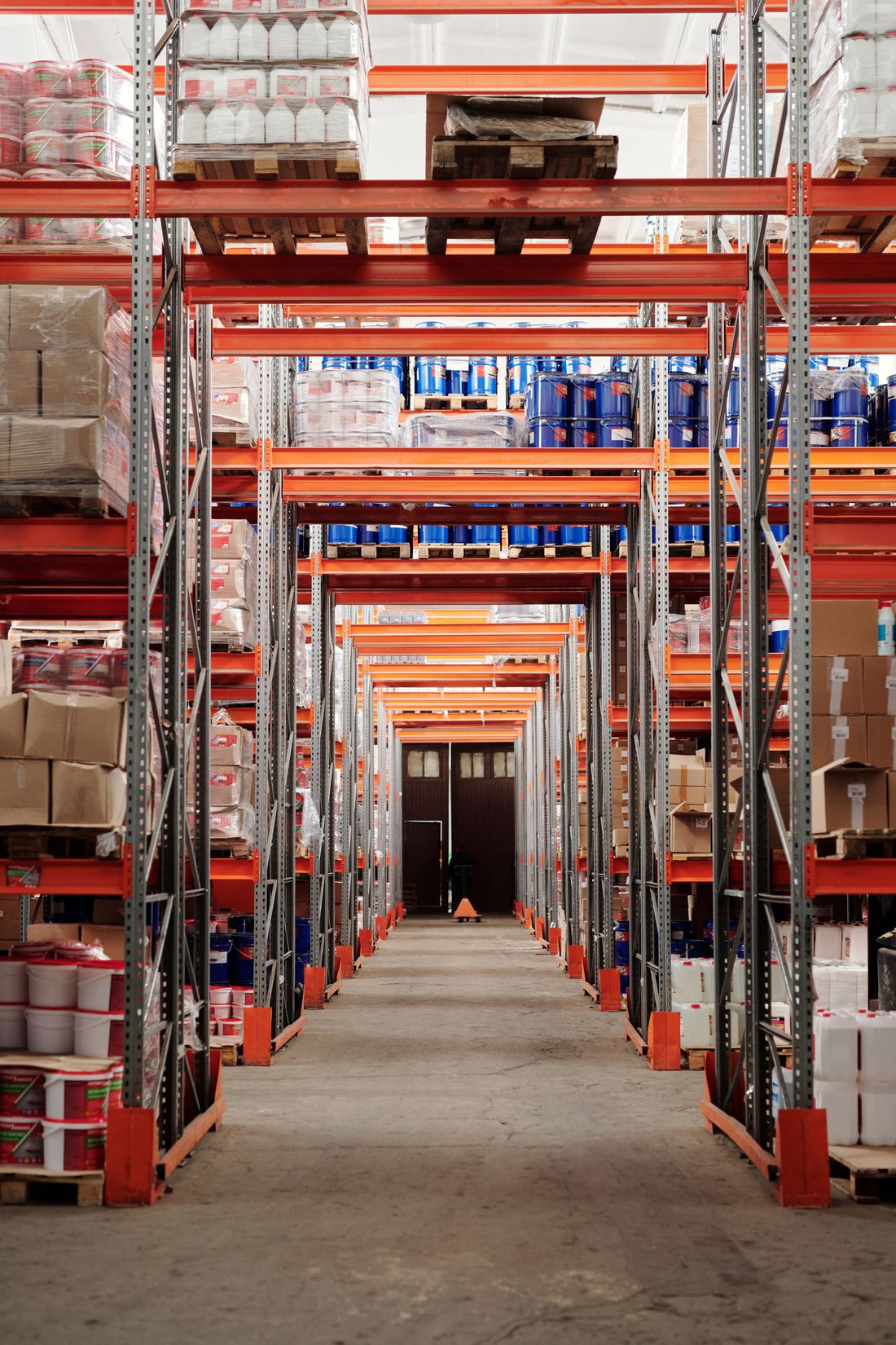 Warehouse racks filled with pallets and stored materials.